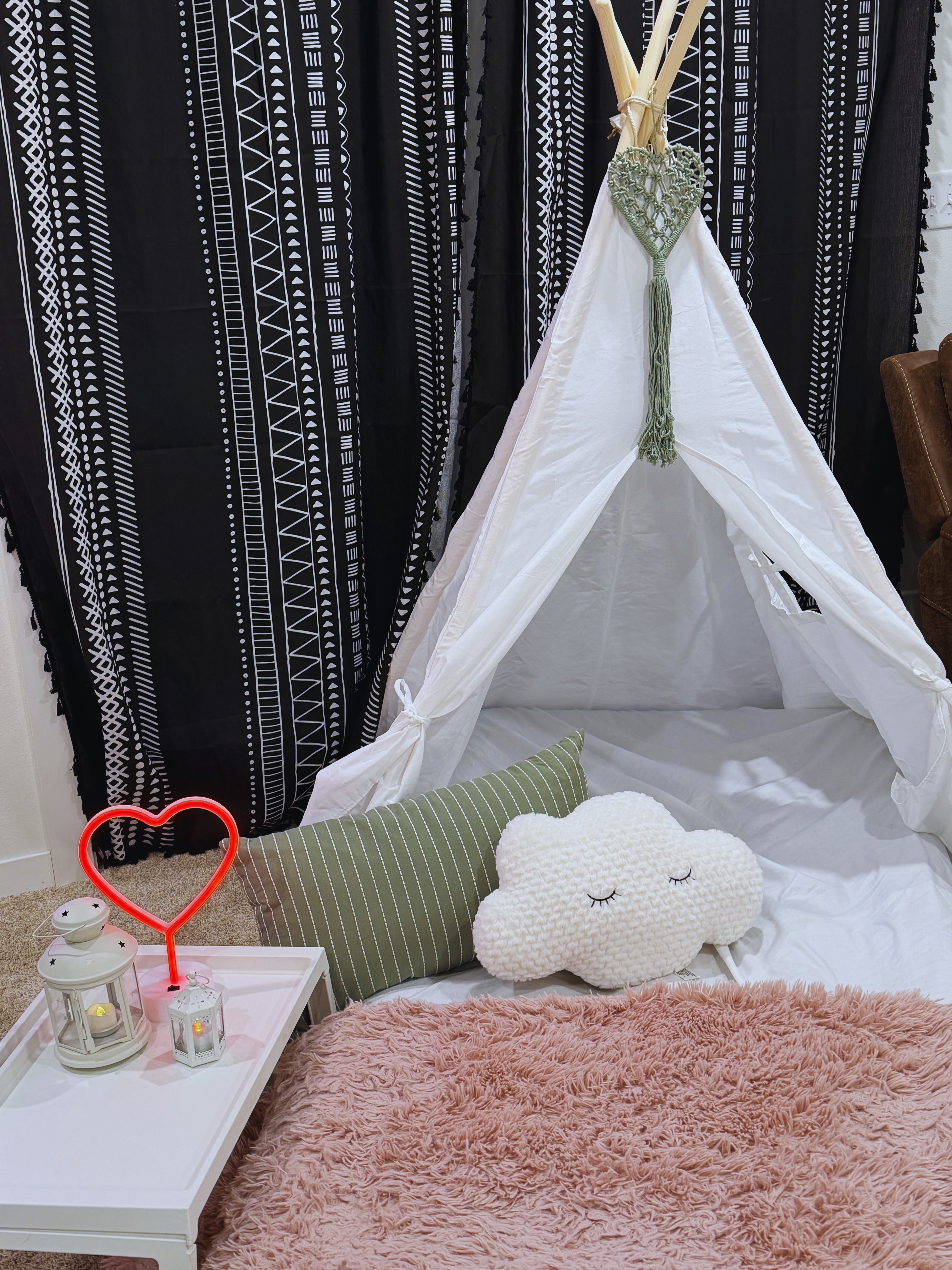 Cozy tent with lantern and cloud pillow