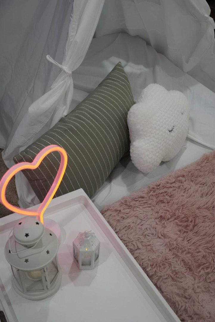 Tent details with sage pillow and cloud accent